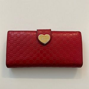 Used authentic red Gucci leather long wallet